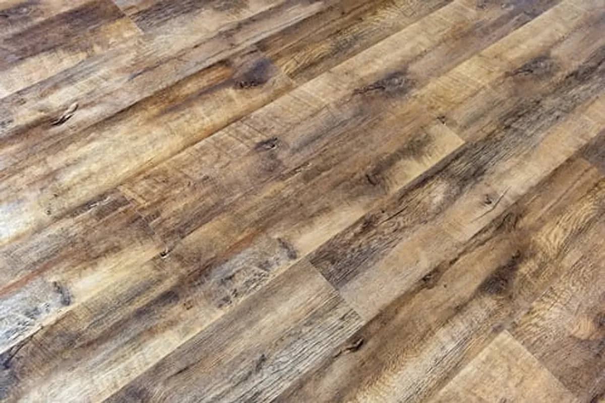 Wide-plank hardwood flooring installation in a Connecticut home interior