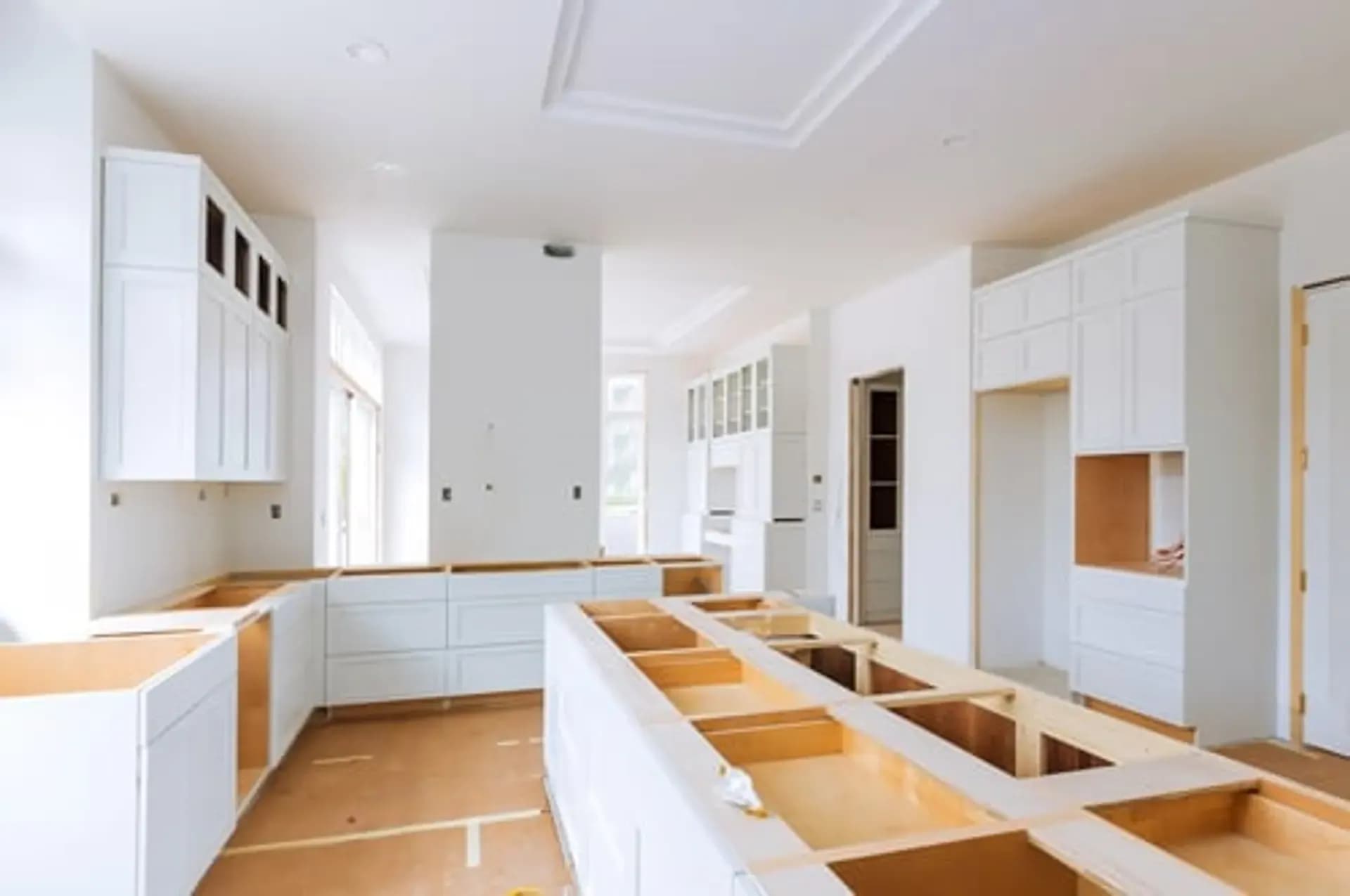 Interior of a home mid-renovation showing new cabinetry and trim work in Connecticut