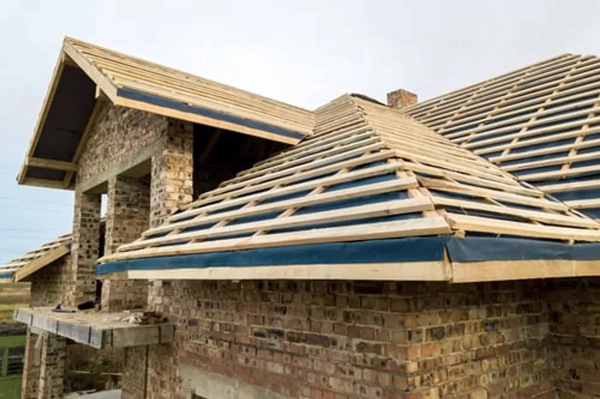 Roof replacement in progress with underlayment installed on a Connecticut residence