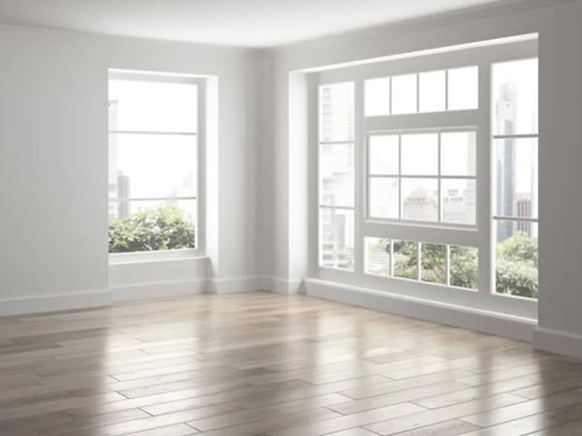Newly installed replacement windows filling a bright Connecticut living room with daylight